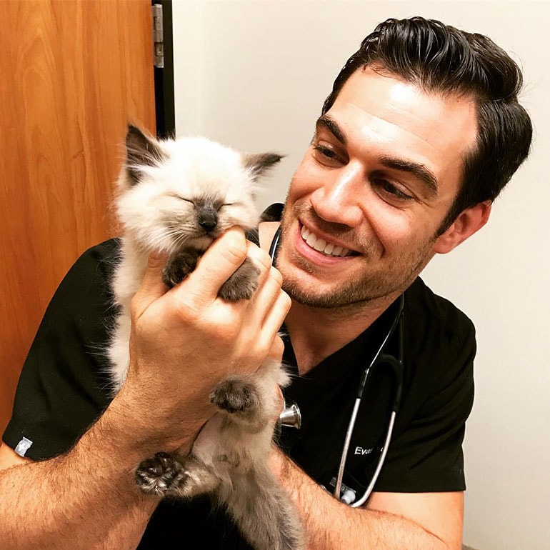 Evan Antin with kitty patient 