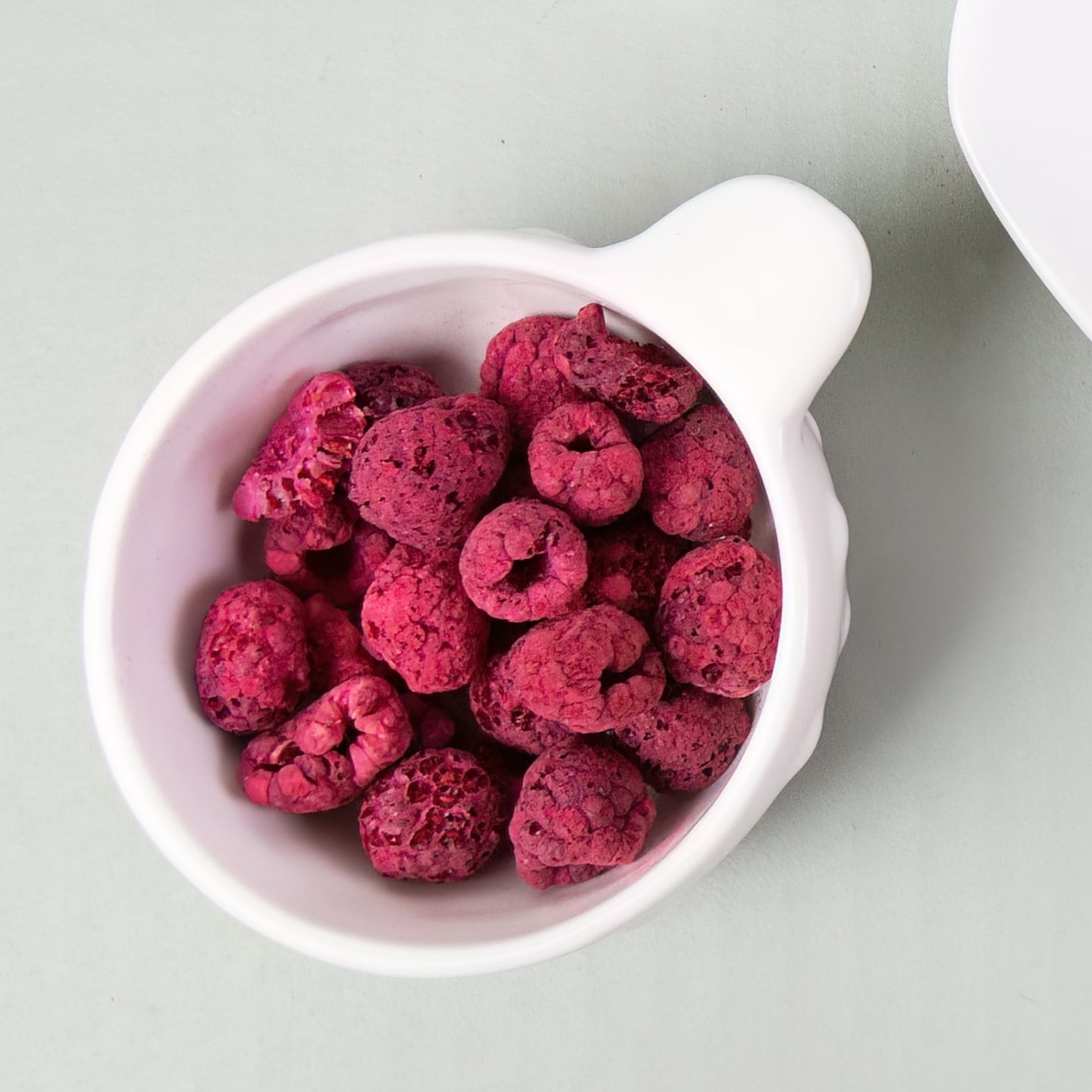 raspberries in cup