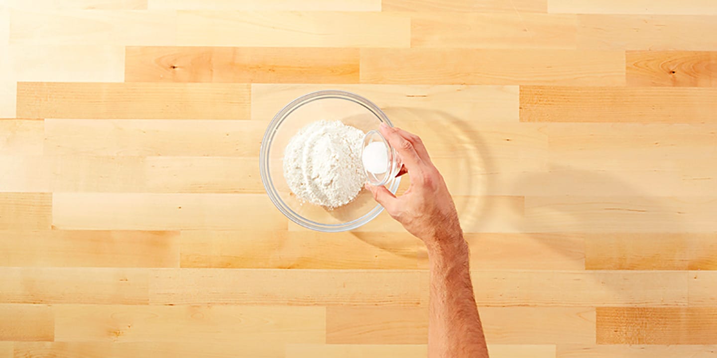 Add flour, salt, eggs and peanut butter into a large bowl and mix until smooth.