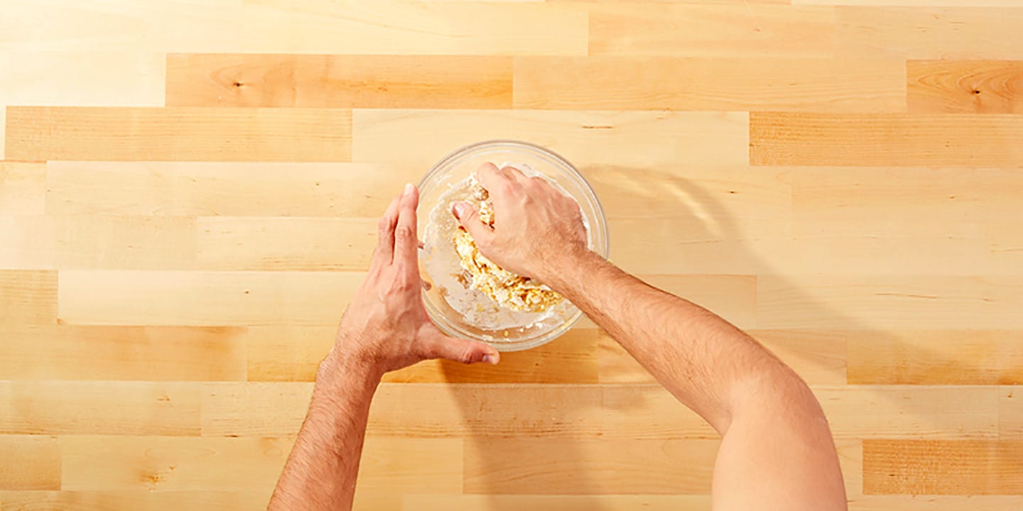 Use hands to shape dough into a ball.